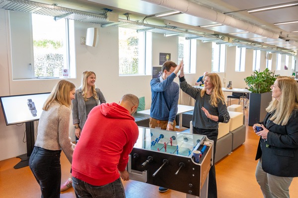 A quick break in between times, here playing "T&ouml;ggelen" (table football) in the cafeteria.